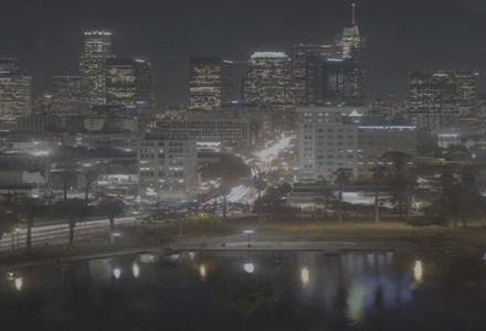 A city nightscape, but the pixels are seemingly bleeding off the page slowly